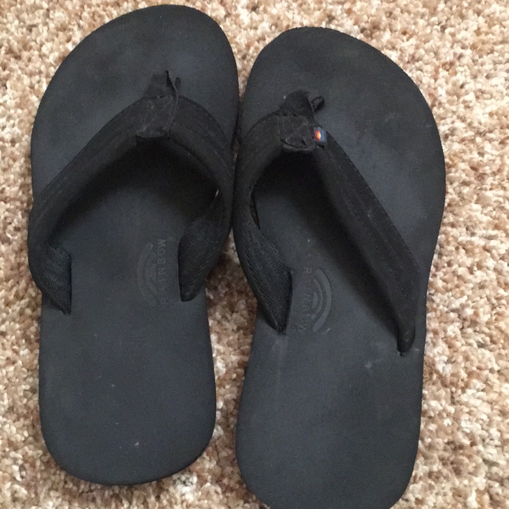 Black rainbow flip flops